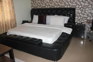Voodi või voodid majutusasutuse Adbates Suites and Recreation toas