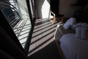 Rúm í herbergi á Bai Ji Yi B&B