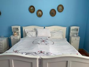 Rúm í herbergi á Apartmani Dragulj