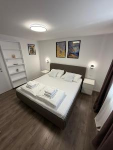 Postel nebo postele na pokoji v ubytování Apartment Goran + 37 fotografií