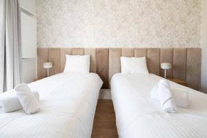 Posteľ alebo postele v izbe v ubytovaní Aparthotel Weissa 7