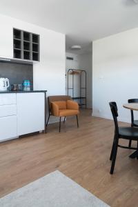 Kuchyňa alebo kuchynka v ubytovaní Aparthotel Weissa 7