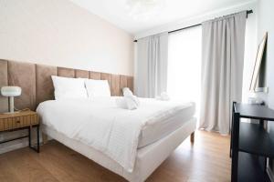 Posteľ alebo postele v izbe v ubytovaní Aparthotel Weissa 7