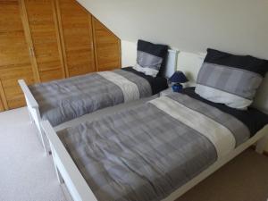 Postel nebo postele na pokoji v ubytování Ferienwohnung Hamburg - Stapelfeld