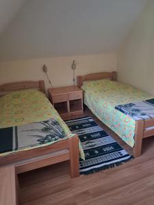 Postel nebo postele na pokoji v ubytování Vikendica Obradović