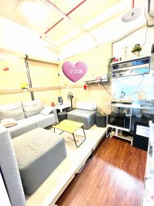 Una cocina o zona de cocina en 晶城青年旅館