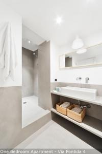 Kúpeľňa v ubytovaní Brera Apartments in Moscova