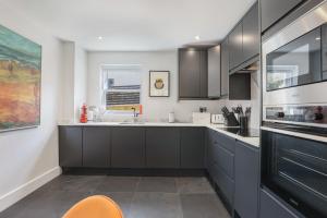 Køkken eller tekøkken på Birdsong Cottage - North East Escapes + 30 billeder