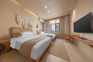 Fotografie z fotogalerie ubytování 抚仙湖栖之伴湖民宿Fuxian Lake Qizhibanhu Homestay v destinaci Chengjiang