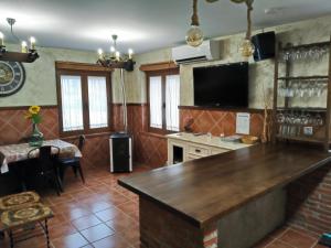 A television and/or entertainment centre at VuT Casa Fabe12