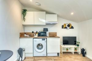 Cuisine ou kitchenette dans l'établissement Le Factory - Studio contemporain - Proche métro B