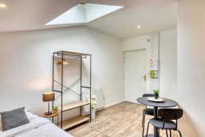 Un ou plusieurs lits dans un hébergement de l'établissement Le Factory - Studio contemporain - Proche métro B