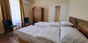 Postel nebo postele na pokoji v ubytování La Kascina Suite & Rooms