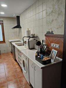 A kitchen or kitchenette at VuT Casa Fabe12