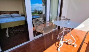 Balkón nebo terasa v ubytování La Kascina Suite & Rooms