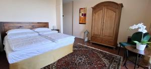 Postel nebo postele na pokoji v ubytování La Kascina Suite & Rooms