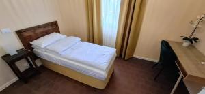 Postel nebo postele na pokoji v ubytování La Kascina Suite & Rooms