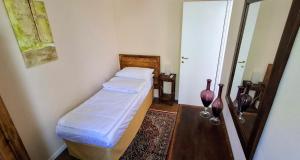 Postel nebo postele na pokoji v ubytování La Kascina Suite & Rooms