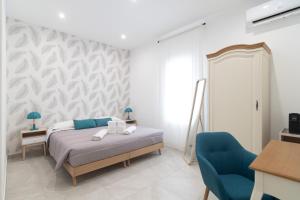 Postel nebo postele na pokoji v ubytování Residenze Miao
