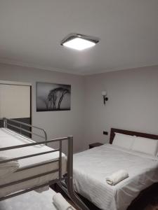 Postel nebo postele na pokoji v ubytování Apple Tree Apartment close to the Airport & SGR Terminal Nairobi