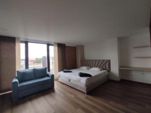 Postel nebo postele na pokoji v ubytování Modelia Living & Parking