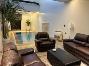 Un lugar para sentarse en فيلا تاجوراء بير أسطى ميلاد 10 fotos más