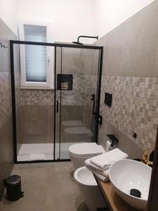 Ένα μπάνιο στο Casa Vacanze Aia Grande