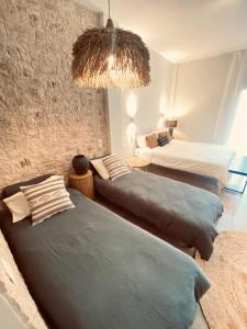 Postel nebo postele na pokoji v ubytování KIPOS-SS residences + 37 fotografií