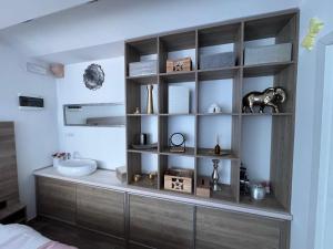Kuchyň nebo kuchyňský kout v ubytování HA-LU Studio Apartman