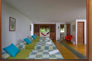 Ένα ή περισσότερα κρεβάτια σε δωμάτιο στο Hotel Cinaruco Caney
