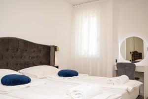 Posteľ alebo postele v izbe v ubytovaní Seaside Luxury Apartment Tanita