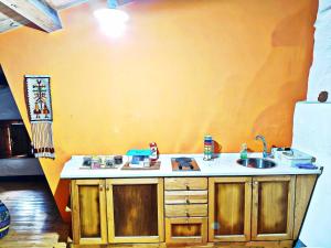 A kitchen or kitchenette at Case Rurali Pentedattilo