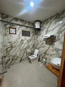 Imagen de la galería de Chanon Holiday Homestay, en Banjār