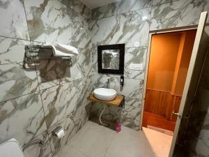 Imagen de la galería de Chanon Holiday Homestay, en Banjār 32 fotos más