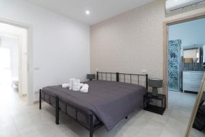 Postel nebo postele na pokoji v ubytování Residenze Miao