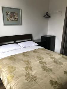 Postel nebo postele na pokoji v ubytování Hotel Bon Accueil