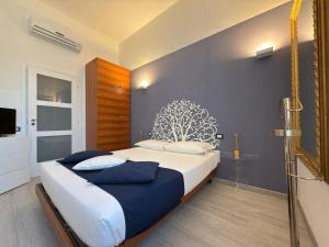 Postel nebo postele na pokoji v ubytování Hotel Europa Varese