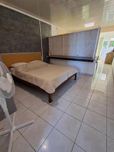 Postel nebo postele na pokoji v ubytování Le Tranqu'Île