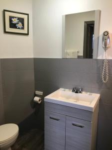 Koupelna v ubytování Hotel Bon Accueil