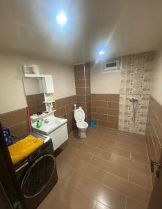 Et badeværelse på Appartement haut standing