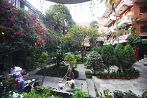 Κήπος έξω από το Nirvana Boutique Hotel
