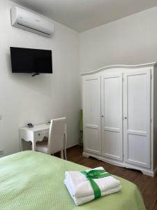 Postel nebo postele na pokoji v ubytování Dente di Leone + 23 fotografií