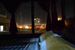 Voodi või voodid majutusasutuse Hotel Columbus toas