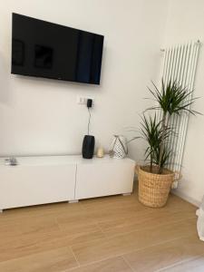TV a/nebo společenská místnost v ubytování Acqua di Mare