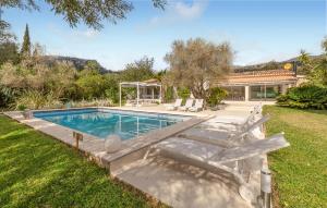 an image of a swimming pool in a yard at Ca'n Fanals in Alcudia +28 photos