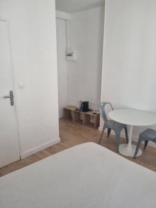 Postel nebo postele na pokoji v ubytování Chambre privée - Vue Tour Eiffel
