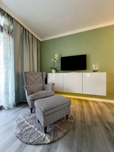 Μια τηλεόραση ή/και κέντρο ψυχαγωγίας στο Appartamento moderno centrale WIFI Free b