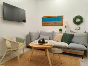 Uma TV ou centro de entretenimento em Sempre Viva