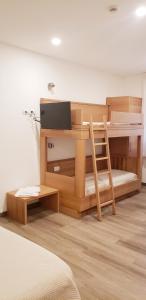 Posteľ alebo postele v izbe v ubytovaní Hotel Cantaleone