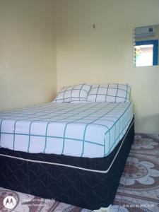 Apartamentos no Farol Velho 객실 침대